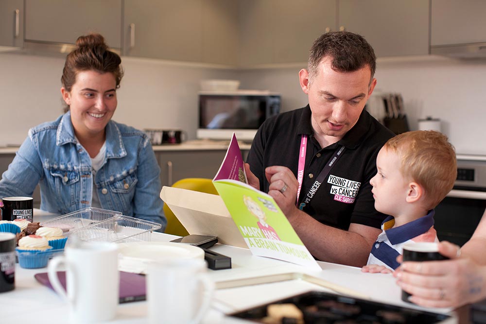 Young lives representative reading a story