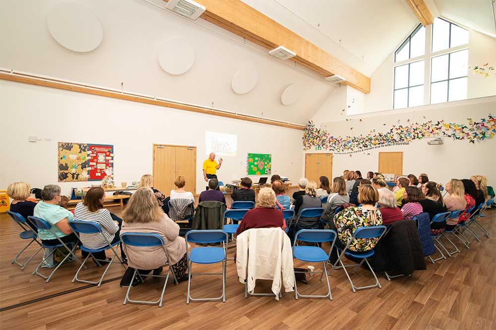 Man delivering information to local community