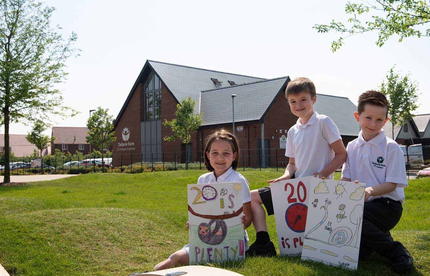 Tadpole Farm Primary school pupils with their designs